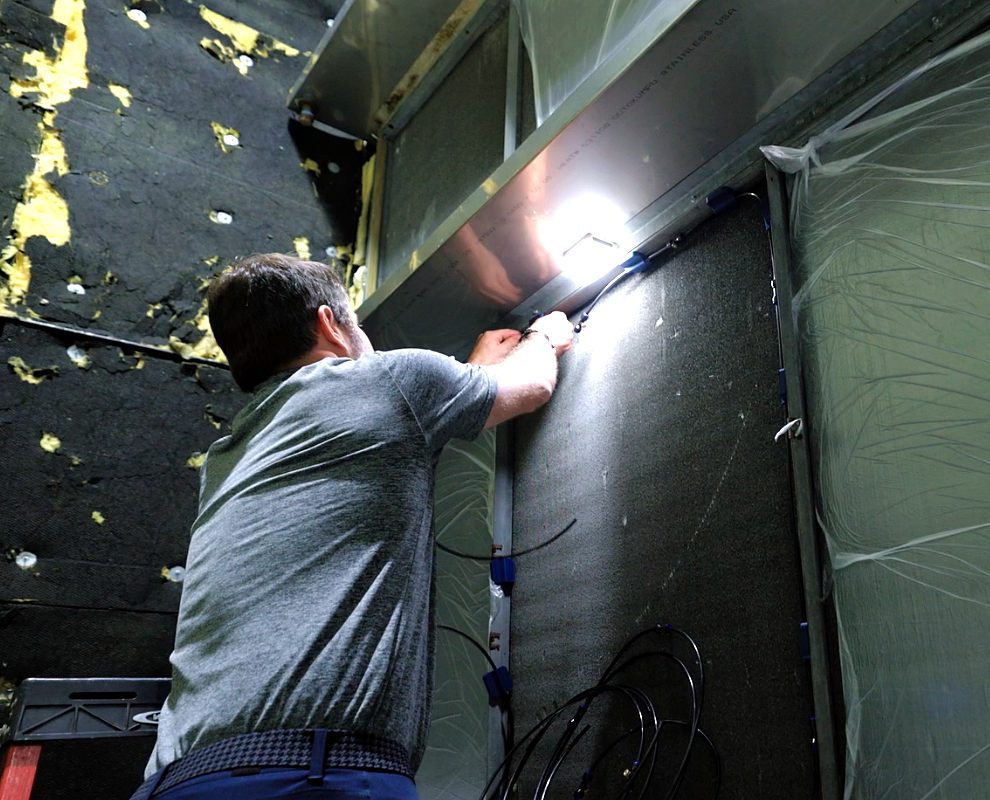Technician at an air handler